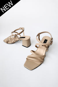 MODI Heeled sandals Beige