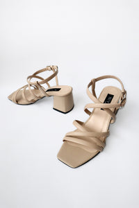 MODI Heeled sandals Beige